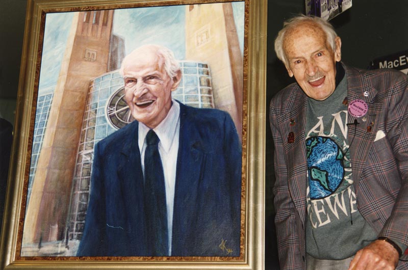 Dr. MacEwan with his portrait on MacEwan Day in 1995.
