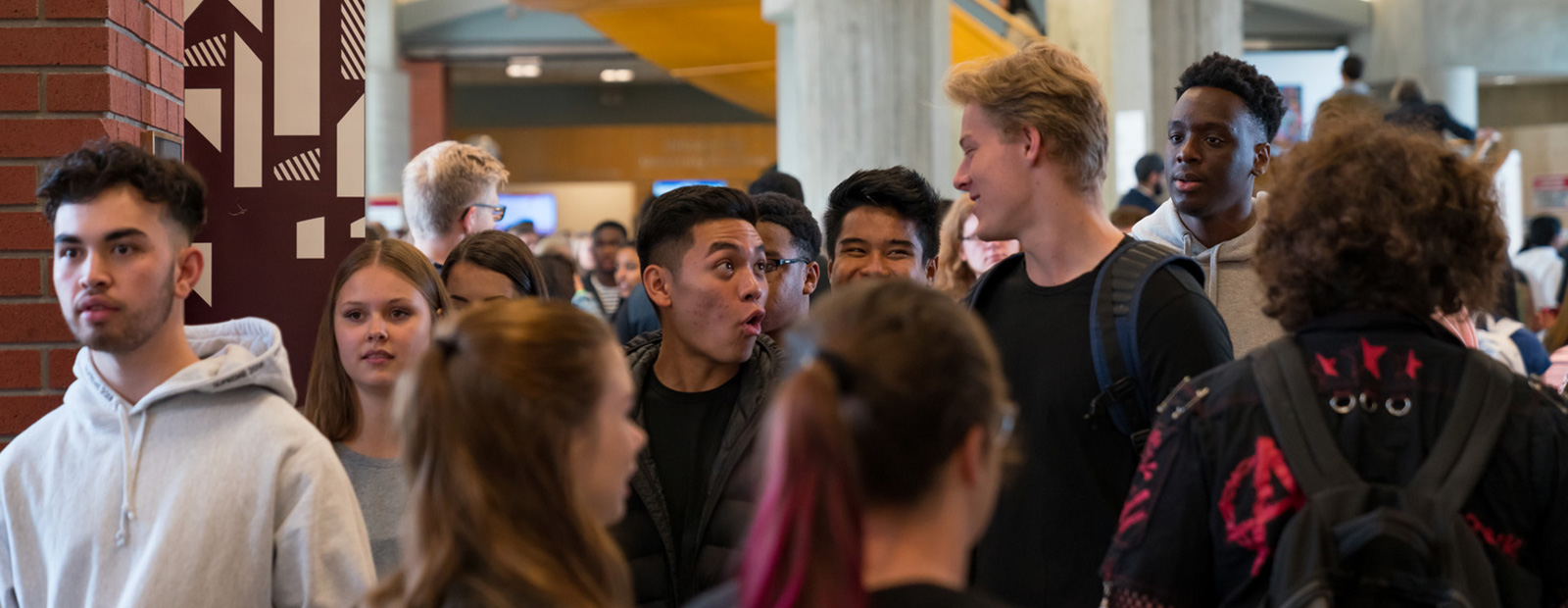 crowded hallway with students walking