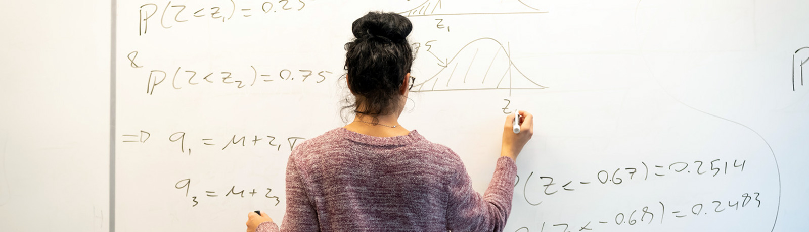 student at whiteboard