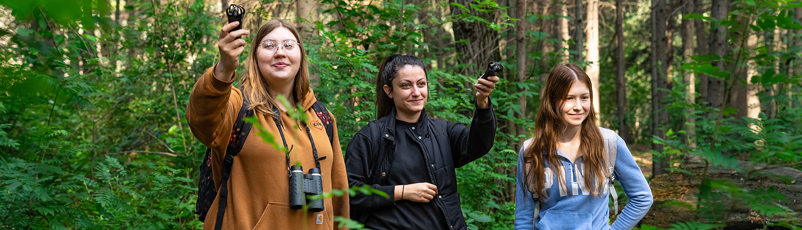 female students in the woods