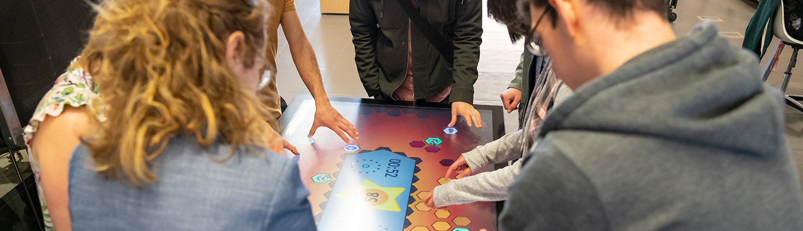 students with surface at library