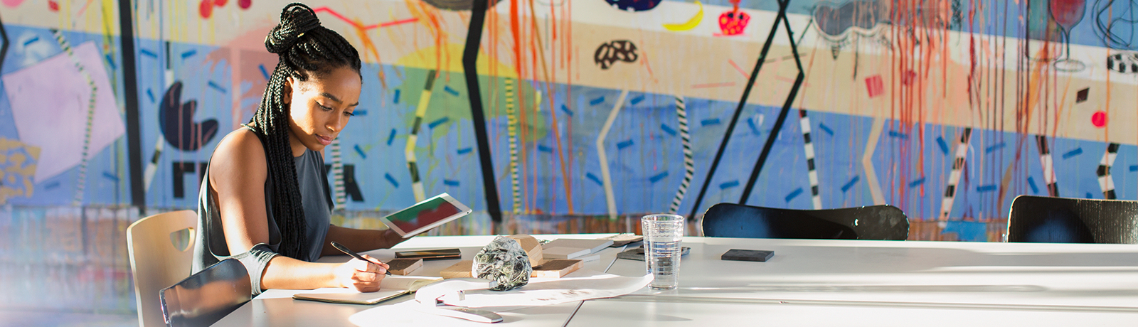 student at table with books