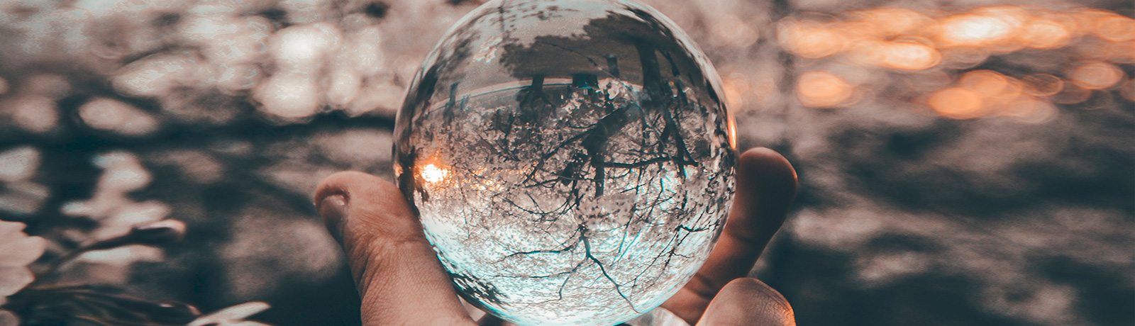 holding glass ball