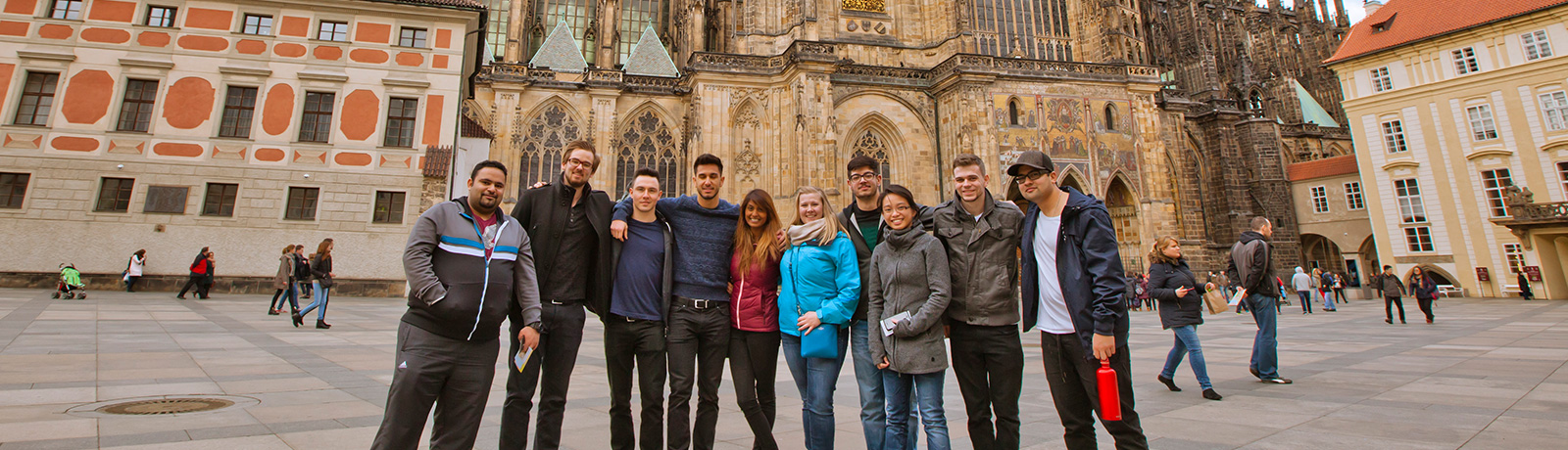 students on international trip in front of church