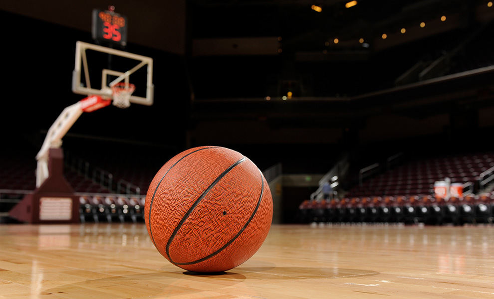 basketball sitting on empty court