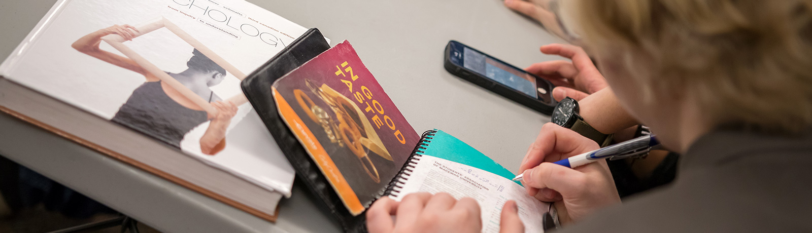 student with sociology books