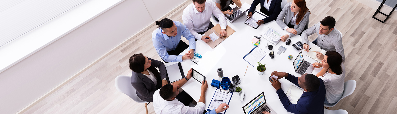 corporate group of people at desk