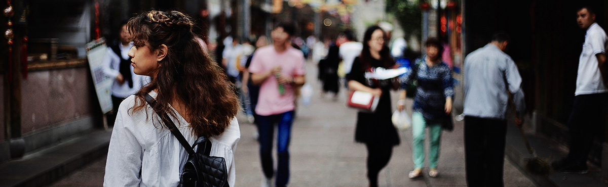 student walking in asia