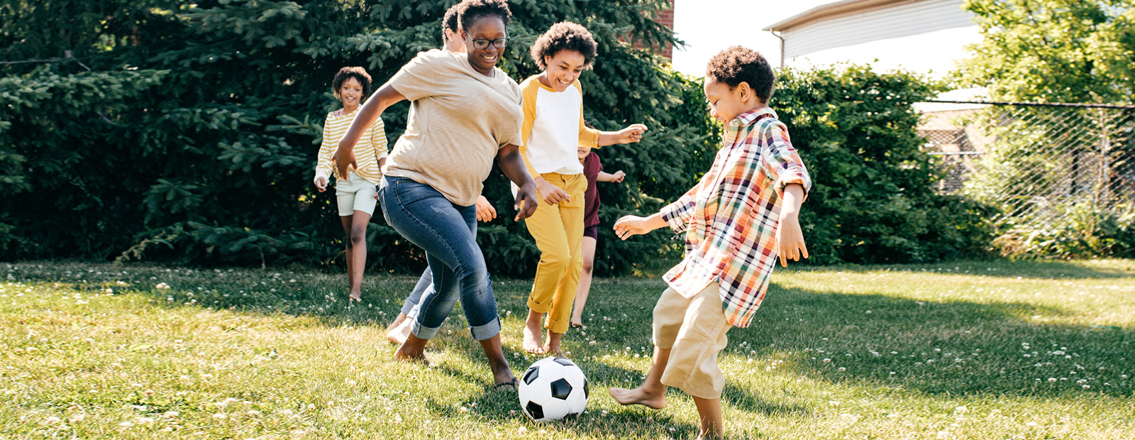 kids playing soccer outside