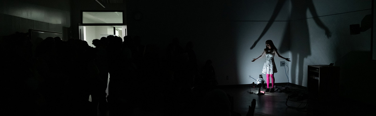 solo presentation in the dark