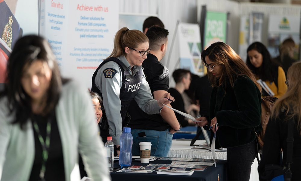 students at police booth