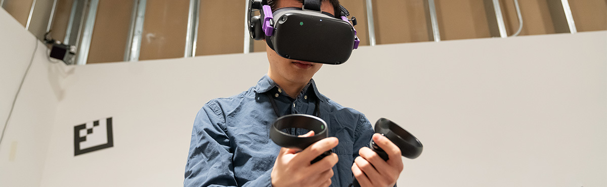 male student in vr room