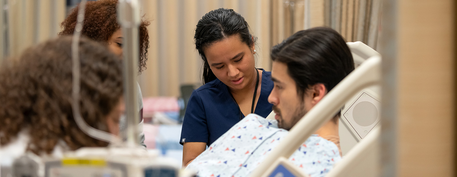 nursing students with patient