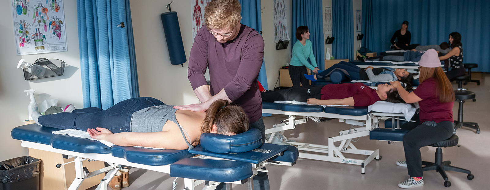 massage students practicing in class