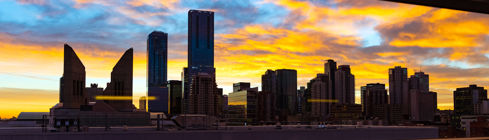 downtown skyline at sunrise with MacEwan towers