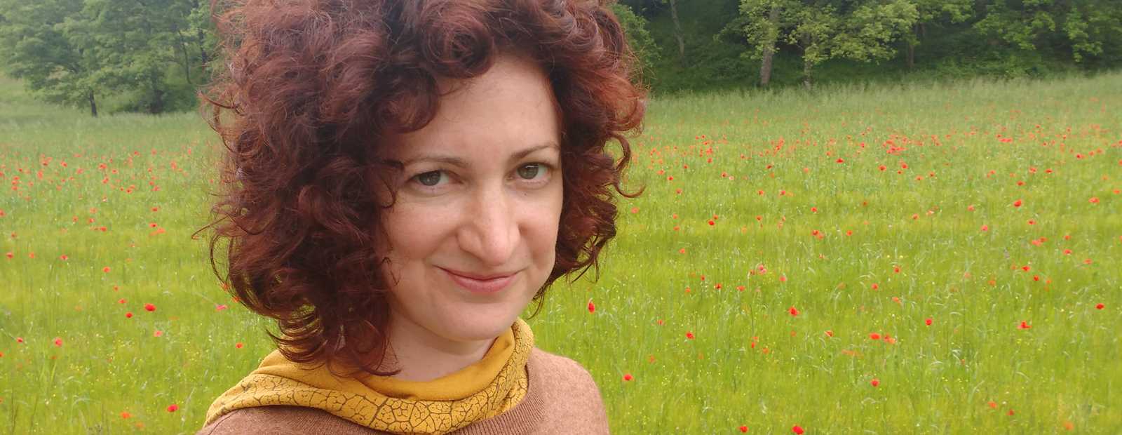 Naomi K. Lewis standing in field