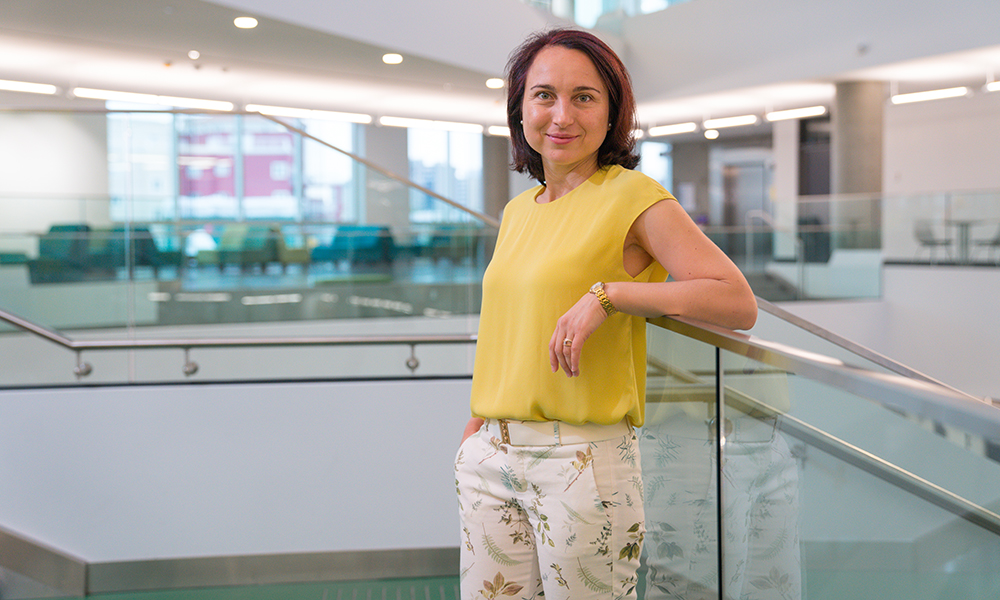 Dr. Albena Pergelova stands in the Allard Hall building on MacEwan University's City Centre Campus.
