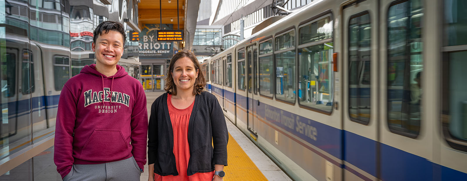 Bachelor of Design student Vik Chu and assistant professor Dr. Isabelle Sperano at the MacEwan LRT Station.