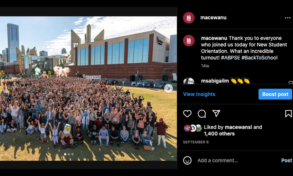 Screen shot of a huge group of students on the lawn outside Building 8