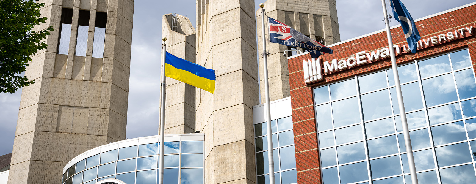 A Ukrainian flag flies outside of Building 6 on MacEwan's campus