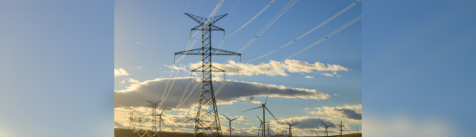 Power lines with a blue sky in the background