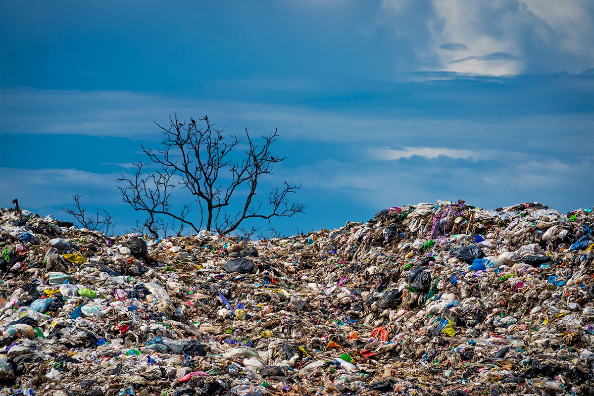 A landfill with layers of waste