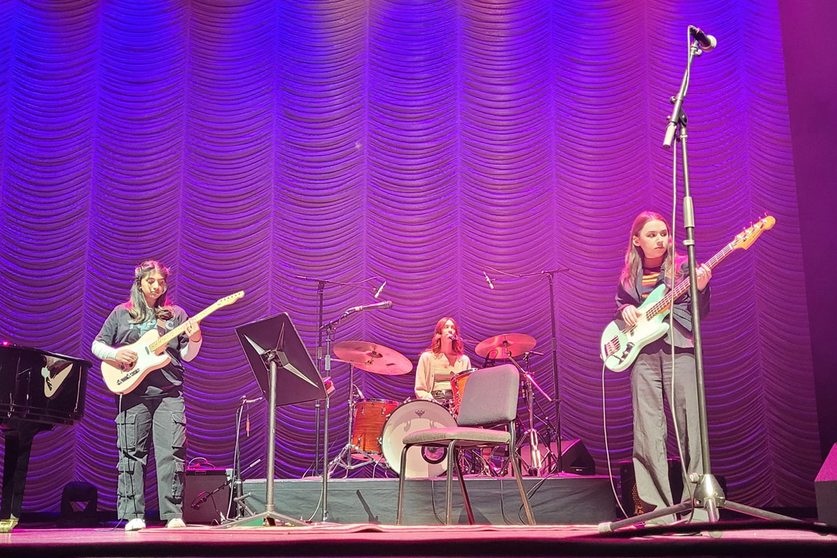 Students from the Sarah McLachlan School of Music perform on stage