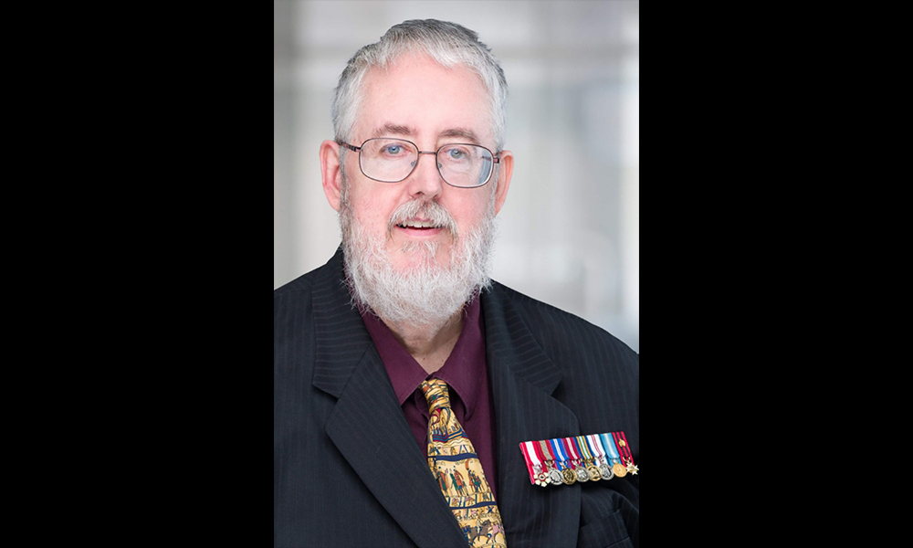 Headshot of Dr. Austin Mardon