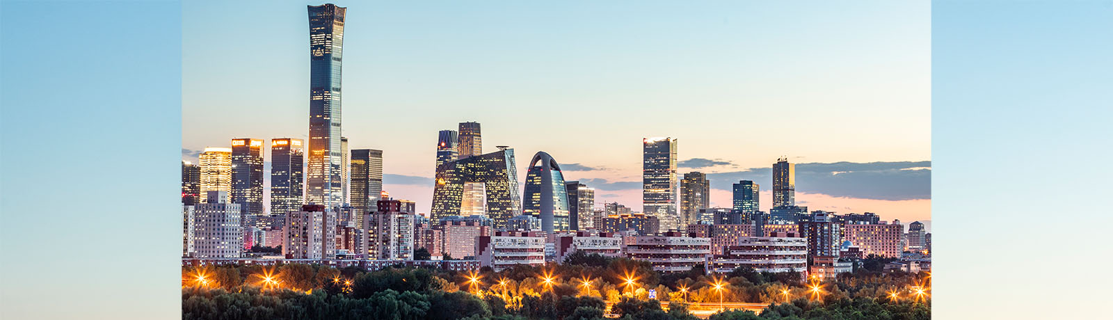 A wide shot of the Beijing skyline in the evening.