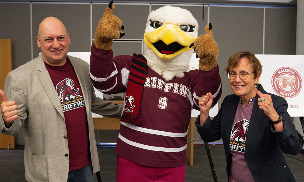 Joel Mrak and Dr. Annette Trimbee with the Grffins mascot