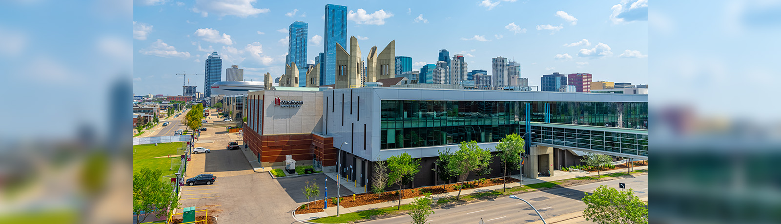 An image of MacEwan's campus with downtown Edmonton skyscrapers in the background.