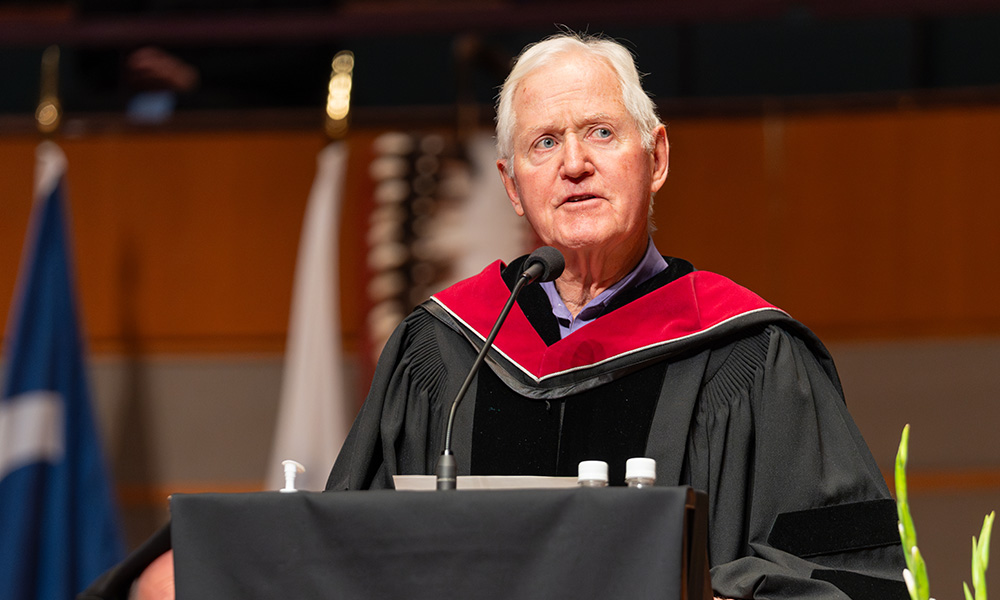 Dr. Kolb addresses graduates from the podium