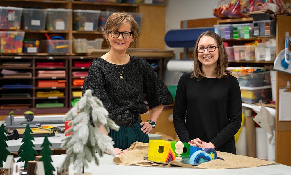 Dr. Nancy Thomas and Dr. Mackenzie Martin in the early learning prep room
