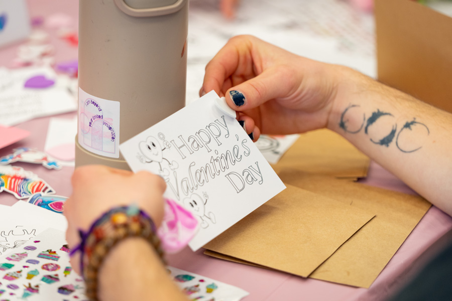 Hands holding a hand-made valentine's day card