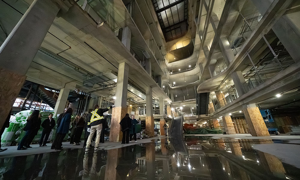 the atrium of an unfinished building that is mostly only concrete at this time