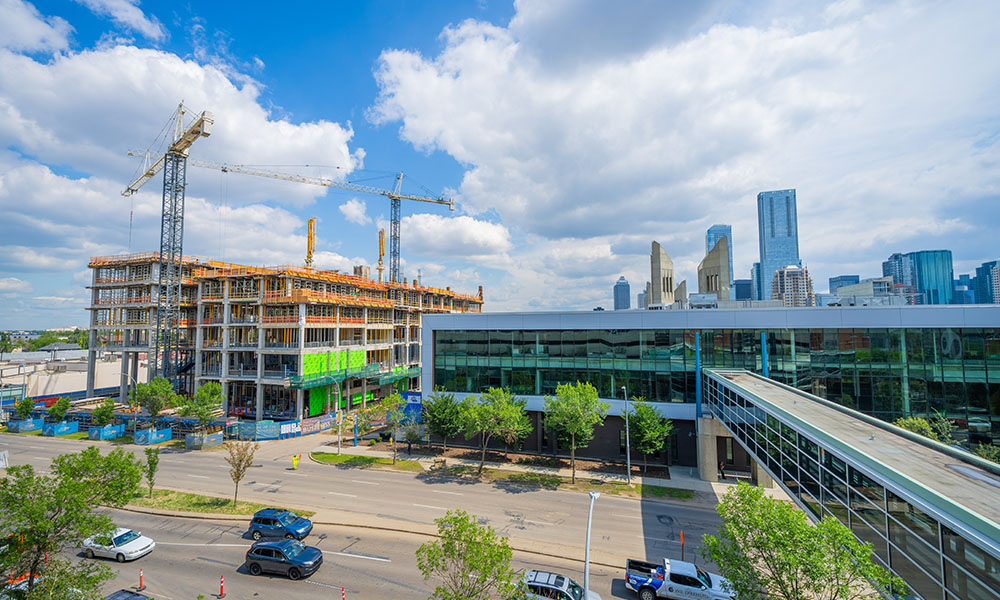 The building now at five floors, only concrete and metal so far. The plastic has been removed from the exterior.  