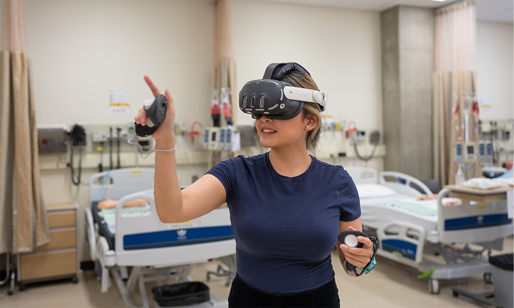 A person wearing a virtual reality headset and holding controllers