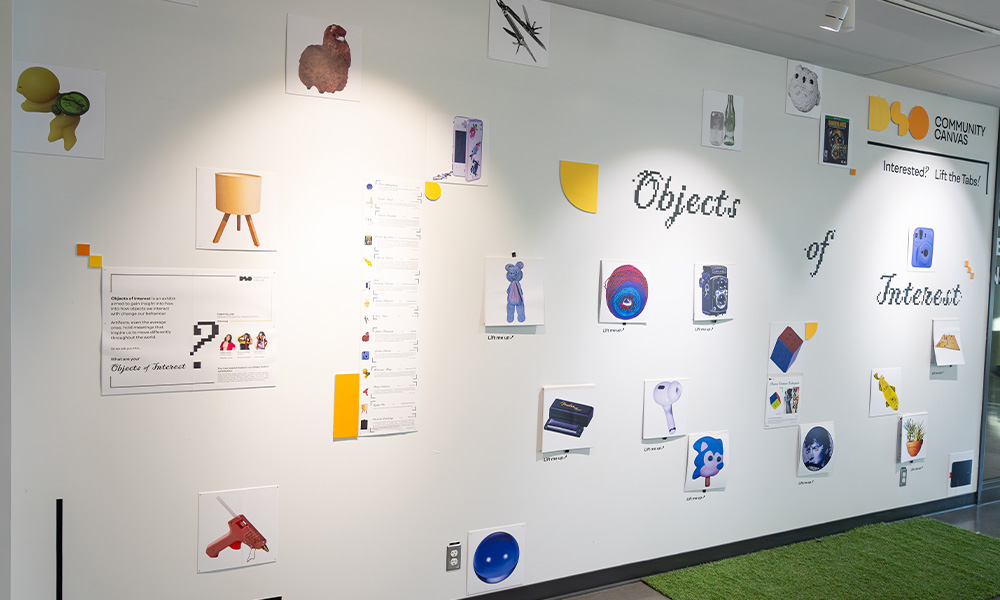 Images of everyday items re posted on a wall, with informational blurbs.