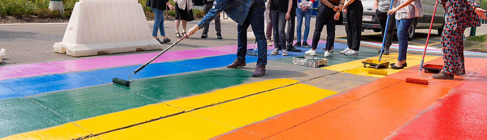 rainbow painted on sidewalk for pride day