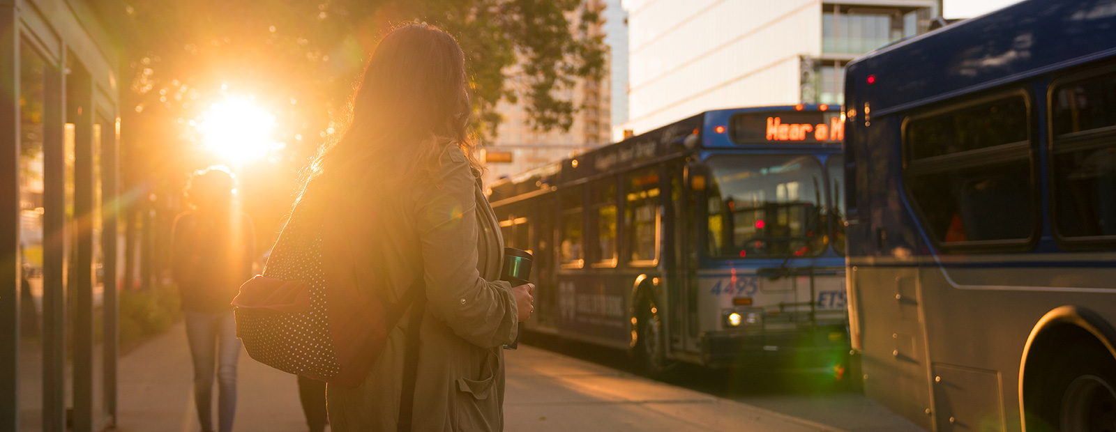 girl waiting for bus