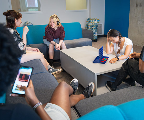 students sitting in study lounge