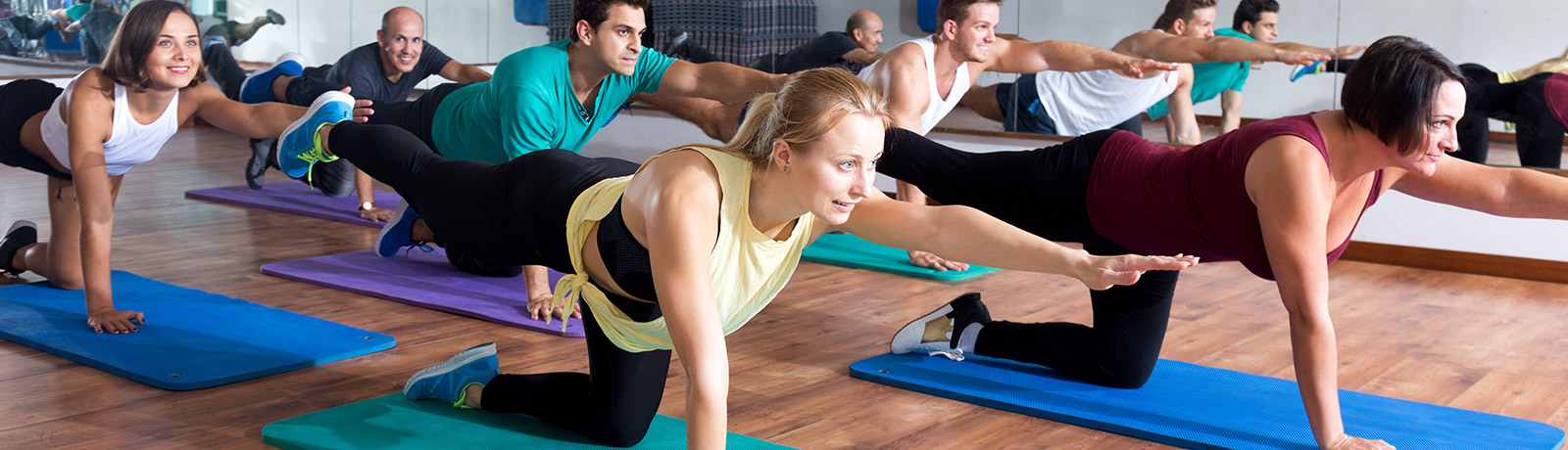 people doing a yoga class
