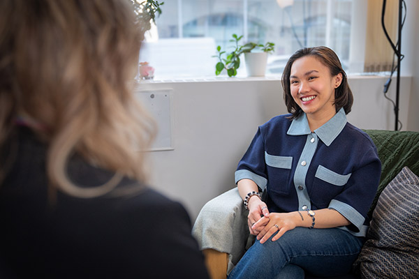 female student speaking to a counsellor