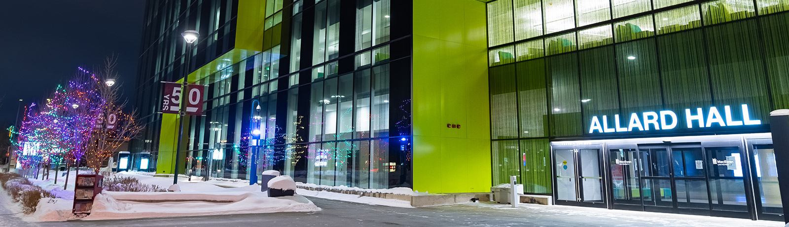exterior of Allard Hall at night