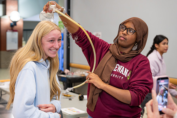 female student at a lab demonstration