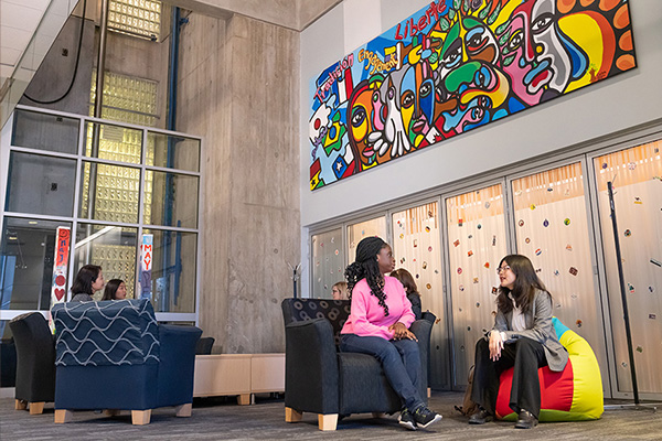 students sitting outside of MacEwan International