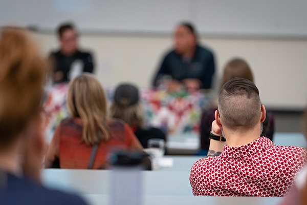 back of student's head in a classroom