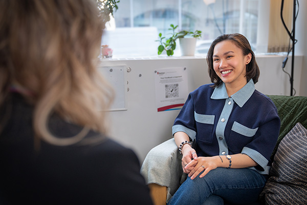 female student speaking with a counsellor