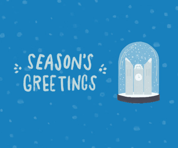 Seasons Greetings text with snowglobe