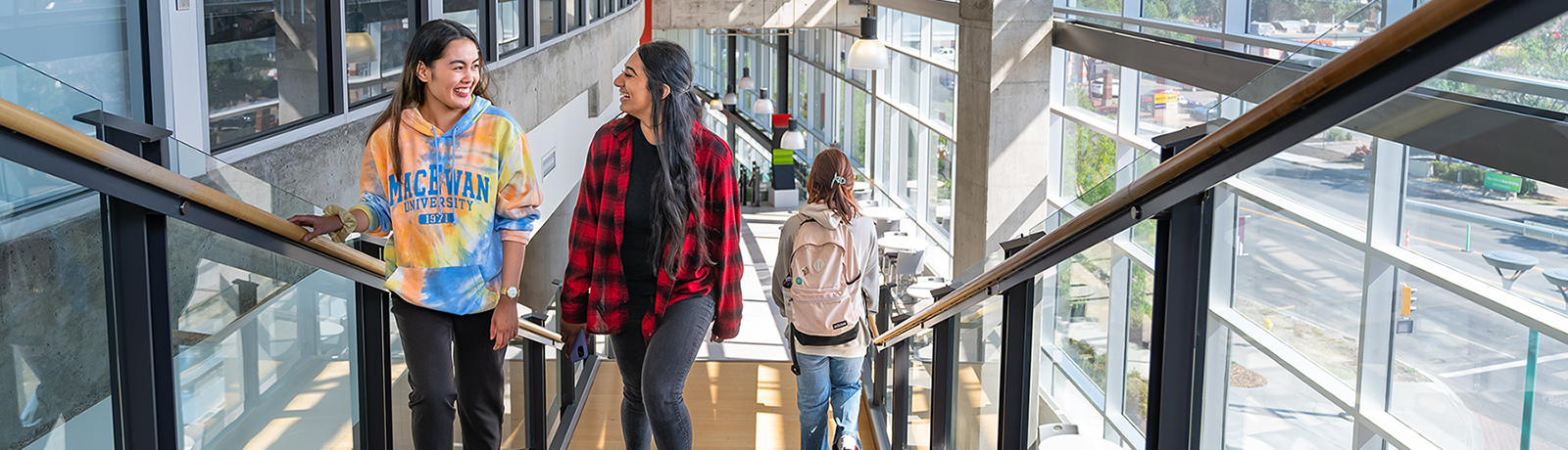 two students talking outdoors